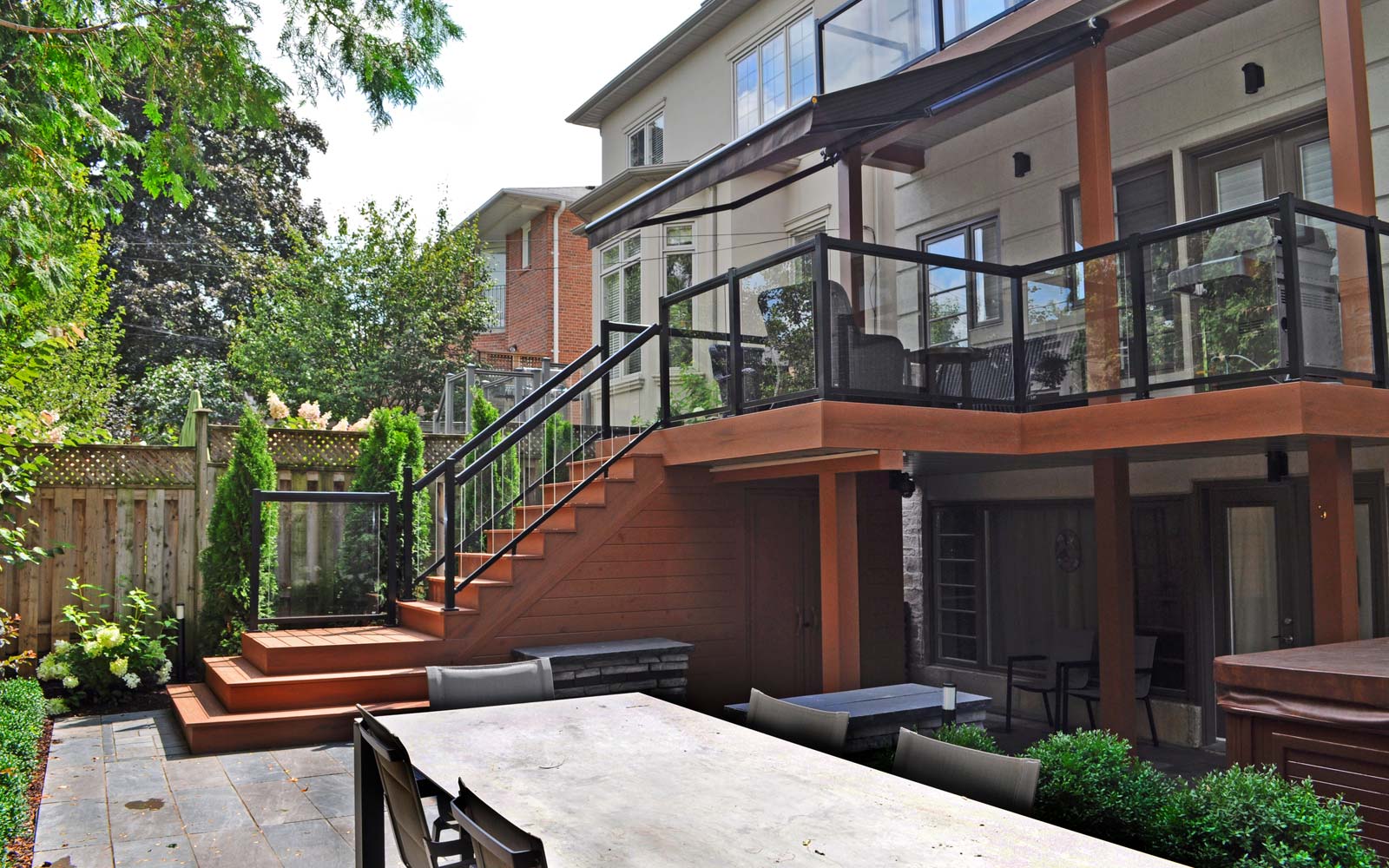 Multilevel Backyard Design with Wood Decking in Toronto