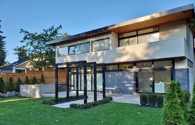 modern wood arbor architectural structure with back yard patio